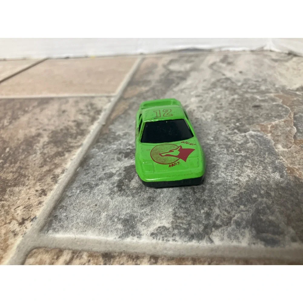 Green Race Car Toy Model Number 12 with Fox Logo‎